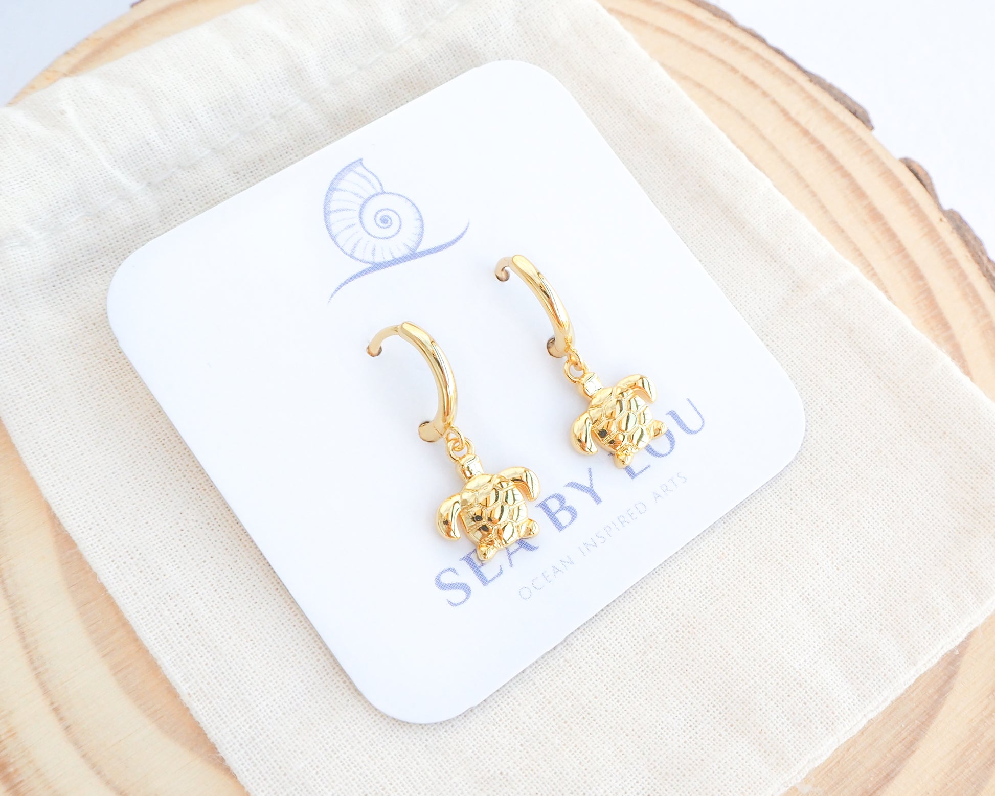 Gold Tiny Turtle Hoop Earrings on display, 14k gold vermeil 925 sterling silver tiny ocean earrings, beach girl jewelry, sea by lou, mix and match beach earrings