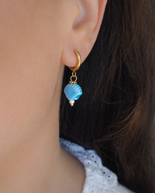 Blue Ceramic Shell Gold Hoop earrings in ear model