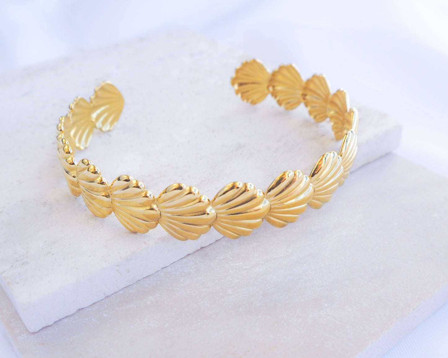 Gold Shell Bracelet, Coastal Bangle Bracelet Adjustable Tiny Gold Shell Bracelet on display