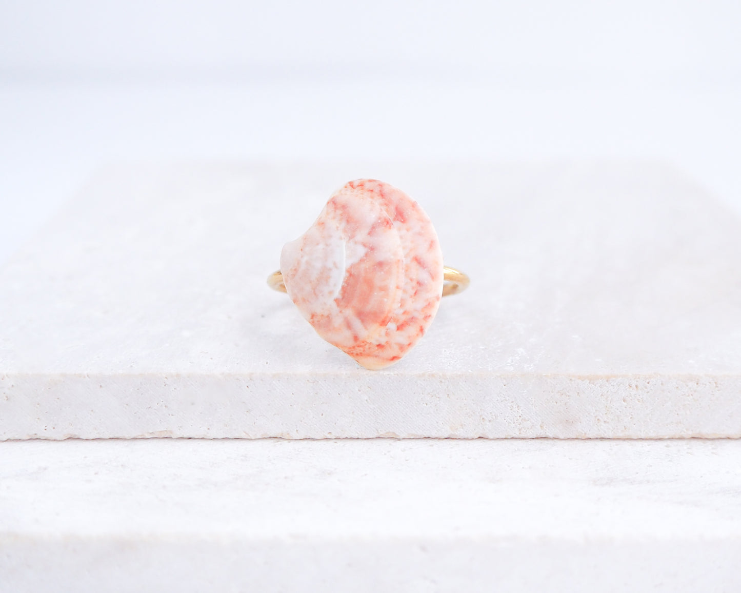 Coral Pink Venus Shell Ring from Portugal displayed on stone, Marble Pink shell on gold ring, handpicked real shell from Portugal