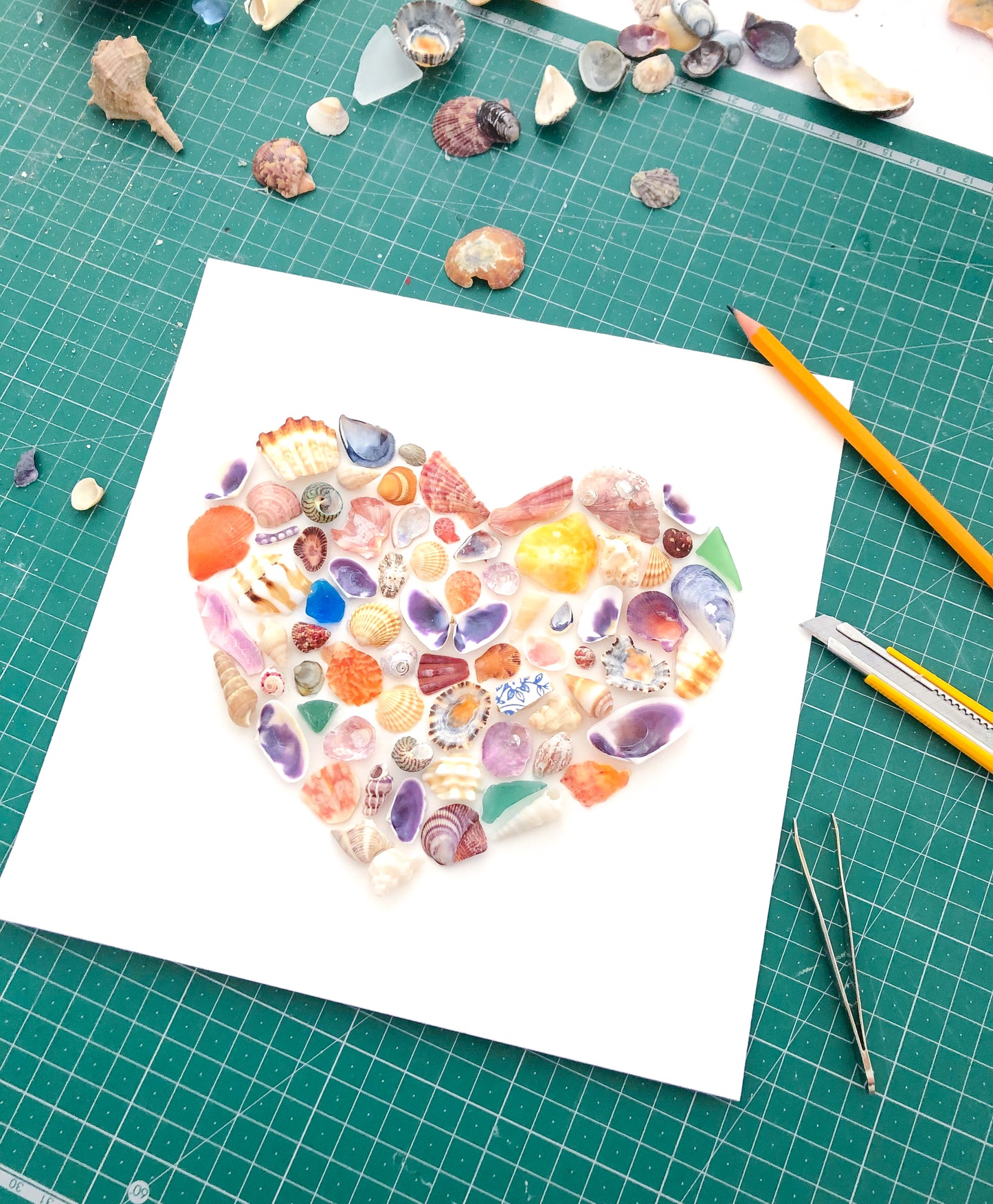 Making of Rainbow Seashell Heart Artwork with colorful shell handpicked from Portugal. Coastal Home Wall Decor, Shell Wall Art, Handmade Shell Artwork, Cute Coastal Nursery Decoration
