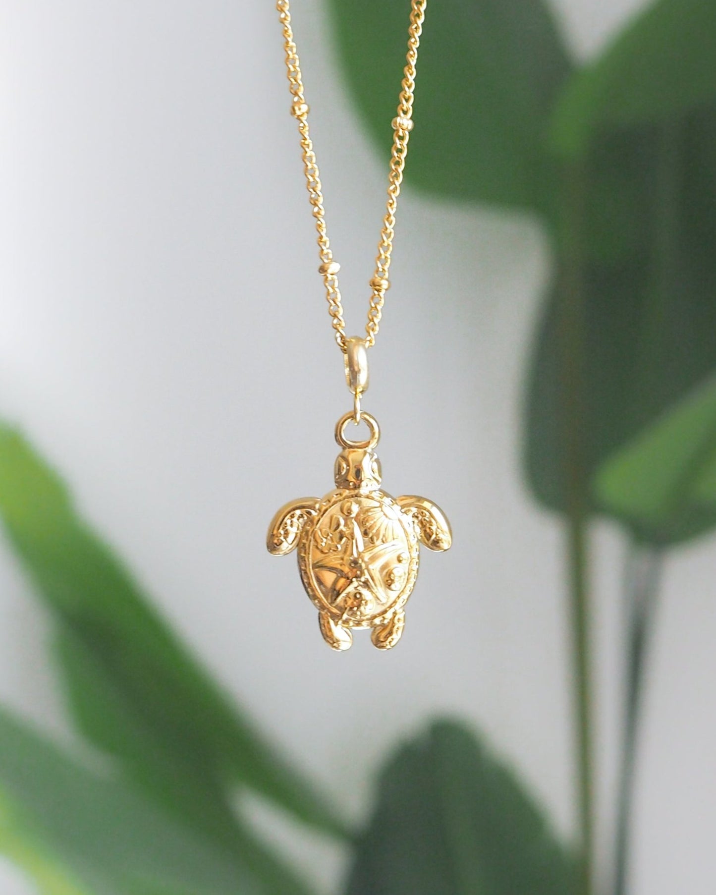 Close up of Gold Big Sea Turtle Necklace