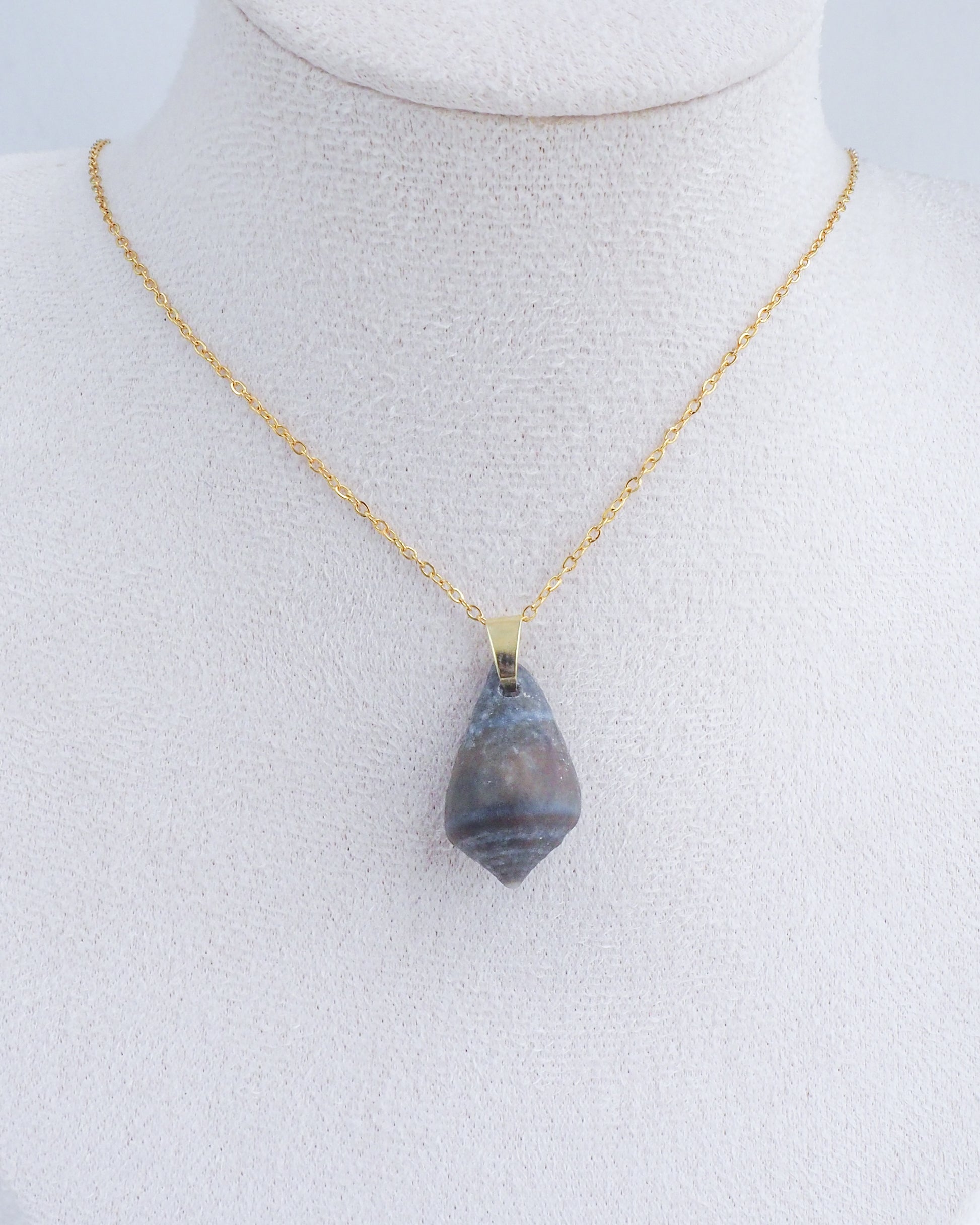 Dark Mediterranean Cone Shell Necklace on neck displayed
