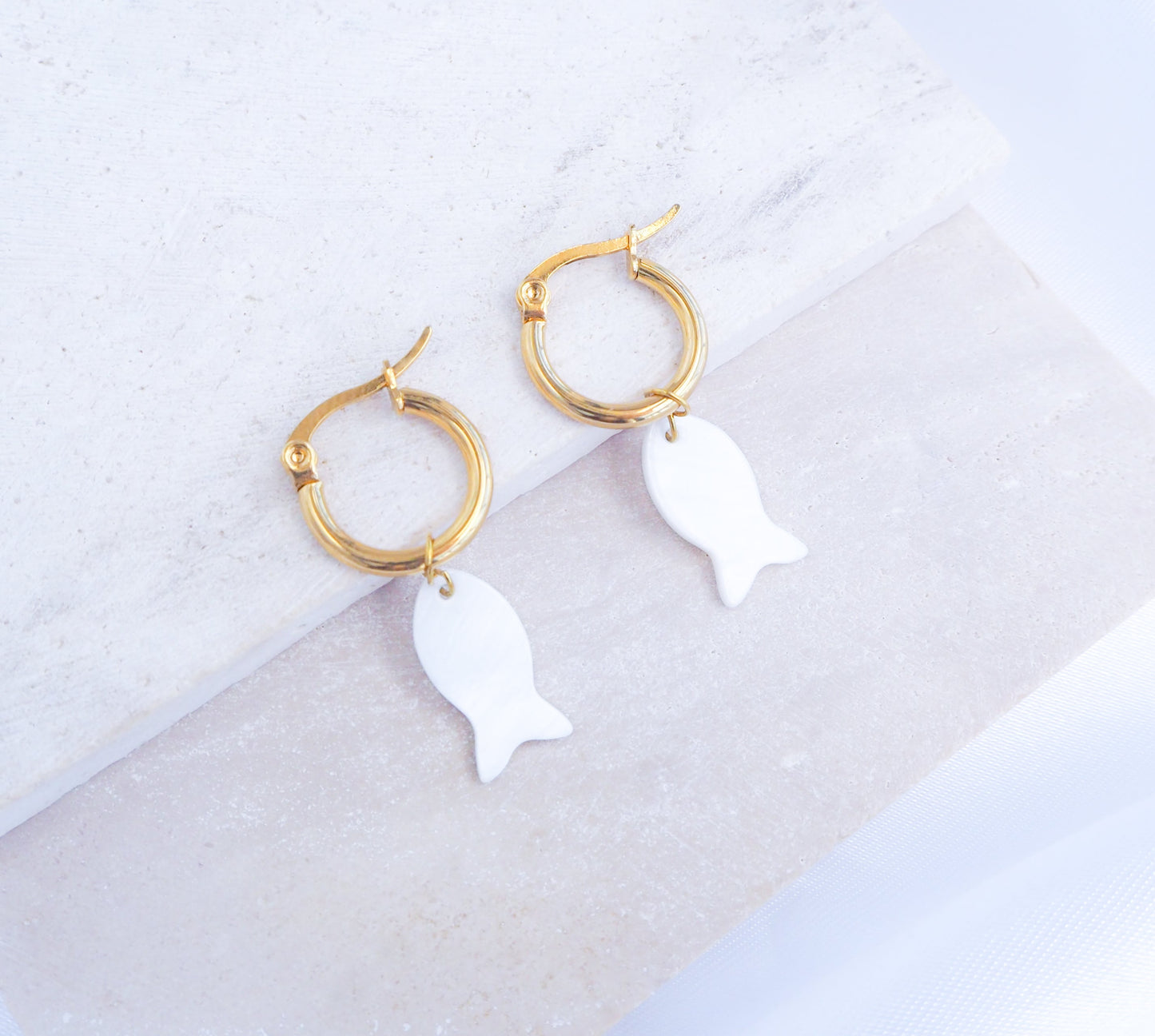 Gold Mother of Pearl Fish Earrings in ear, gold fish shell earrings from Portugal, Starfish Earrings, Sea Star, Coin Sun Earrings