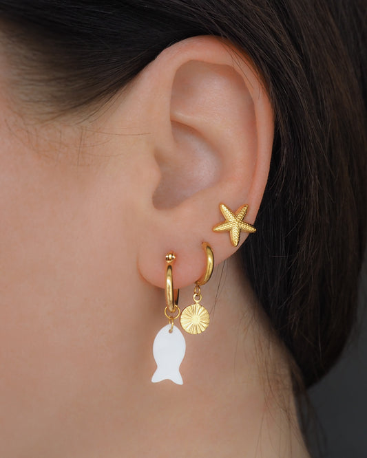 Gold Mother of Pearl Fish Earrings in ear, gold fish shell earrings from Portugal, Starfish Earrings, Sea Star, Coin Sun Earrings