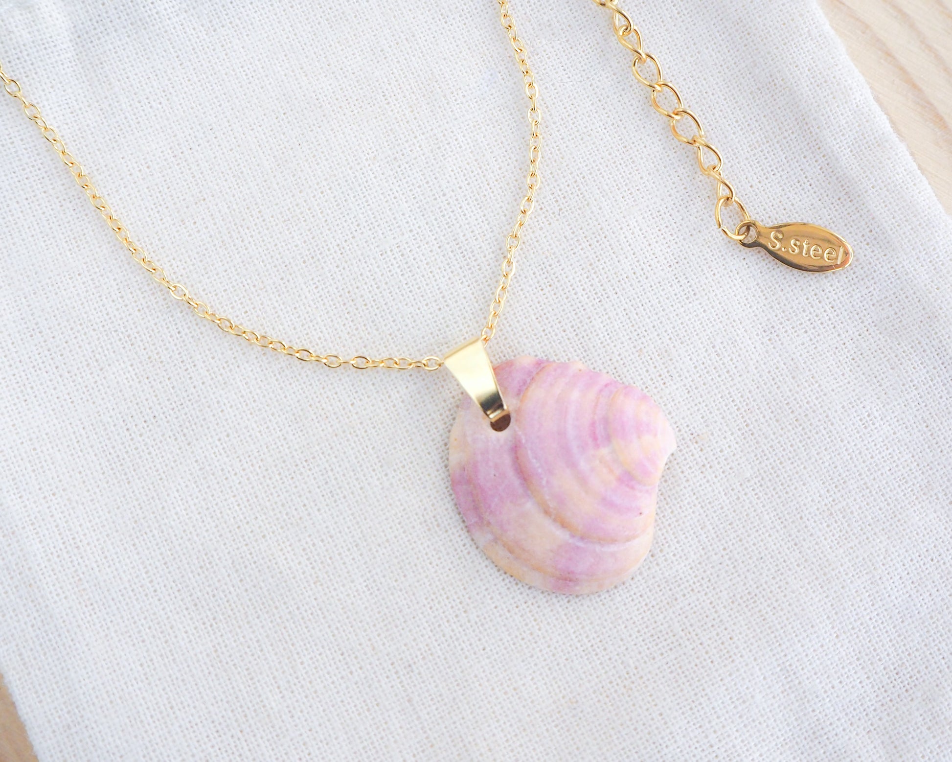 Gold Pink Orange Venus Shell Necklace on display, Banded Venus Shell from Portugal, Shell jewelry, Sea by Lou