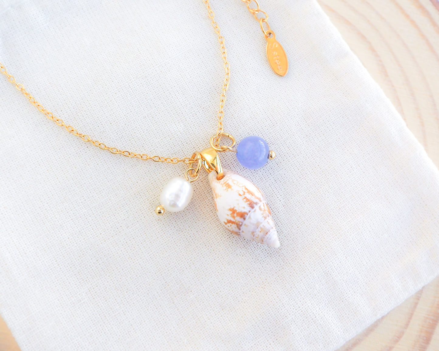 Rustic Dove Shell Angelite Gemstone Pearl Necklace on display, Angelite Gemstones Real Shell Jewelry, Shell from Algarve Portugal, Seabylou