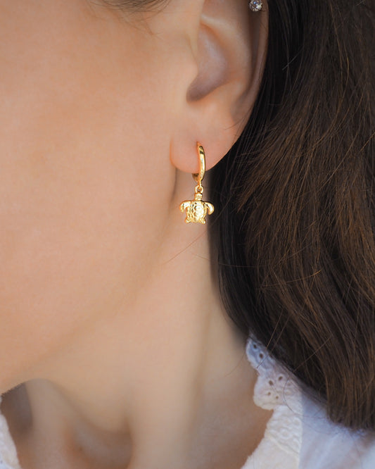 Tiny Turtle Hoop Earrings in ear of model, 14k gold vermeil 925 sterling silver tiny ocean earrings, beach girl jewelry, sea by lou, mix and match beach earrings