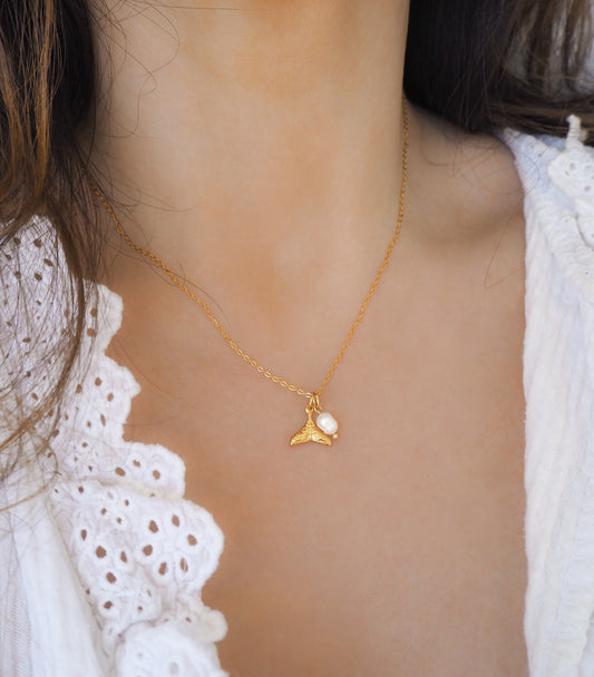 Gold Whale Tail Pearl Necklaces on model with freshwater pearls and 18k gold whale pendant
