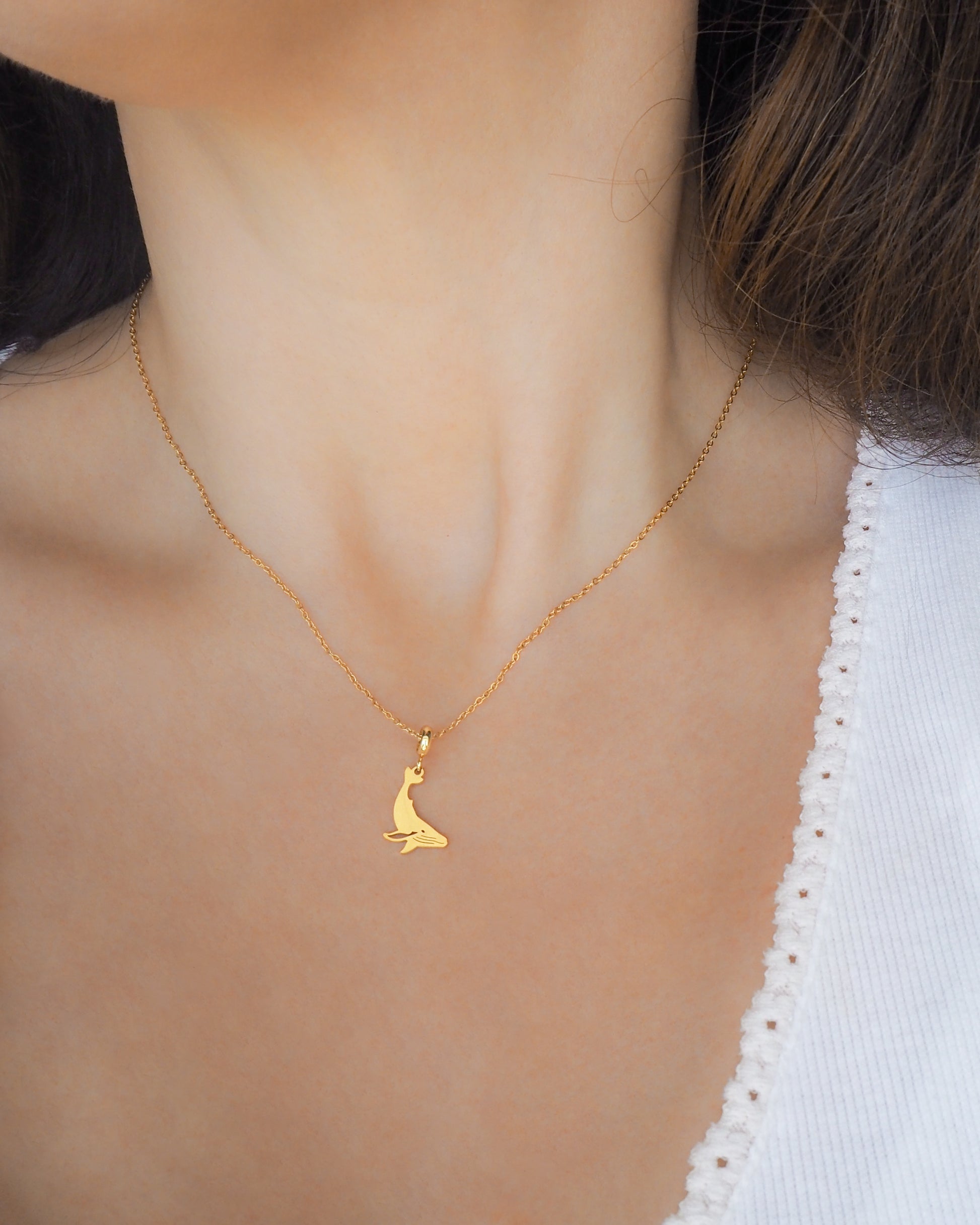 Gold Whale Necklace on model, Gold Plated Waterproof Ocean Inspired jewelry
