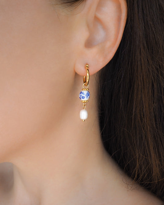 Side view of ear model with Azulejo Pearl Gold Earrings from Portugal, Lisbon Tile Jewelry on model