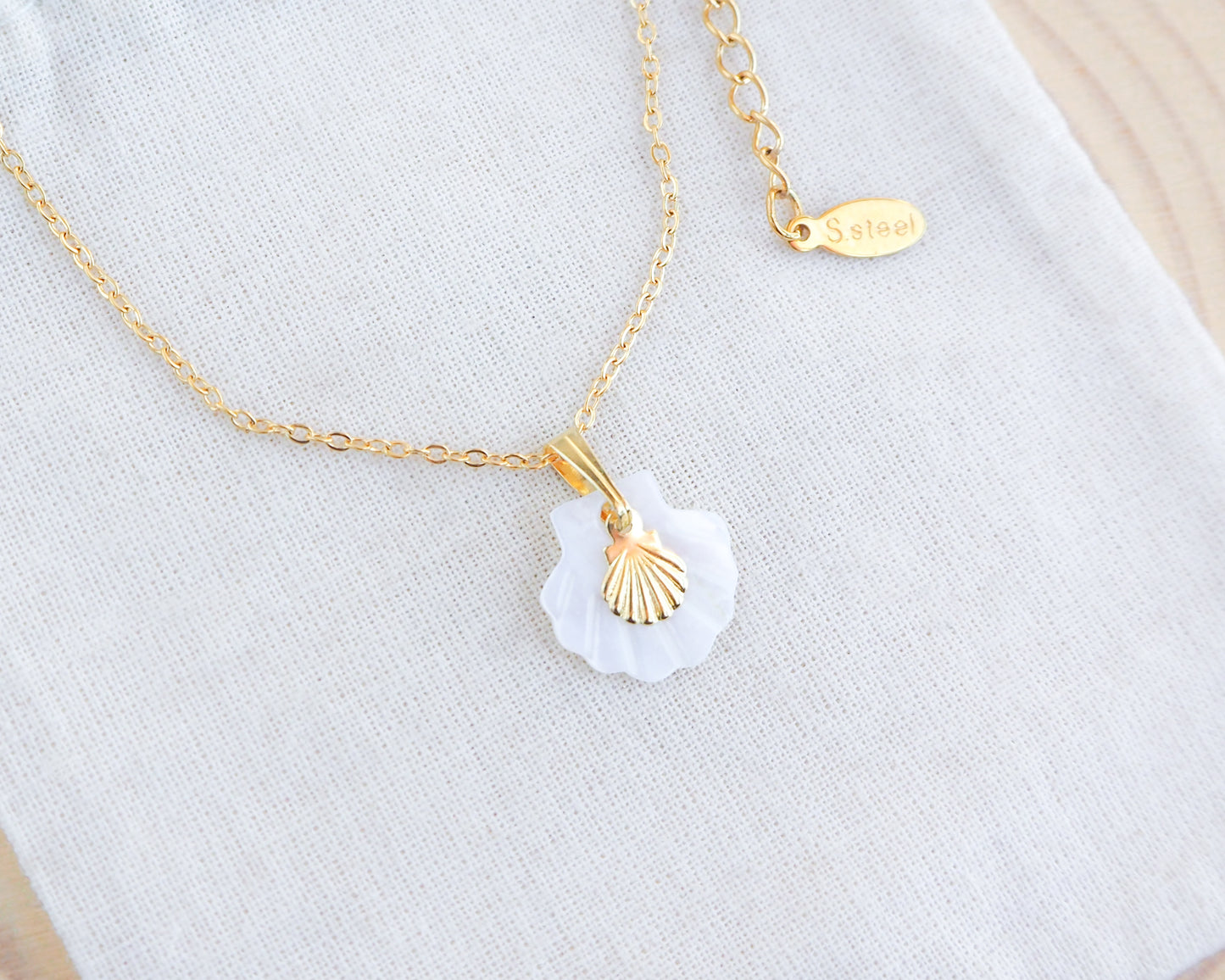 Necklace with Gold Shell Mother of Pearl on display