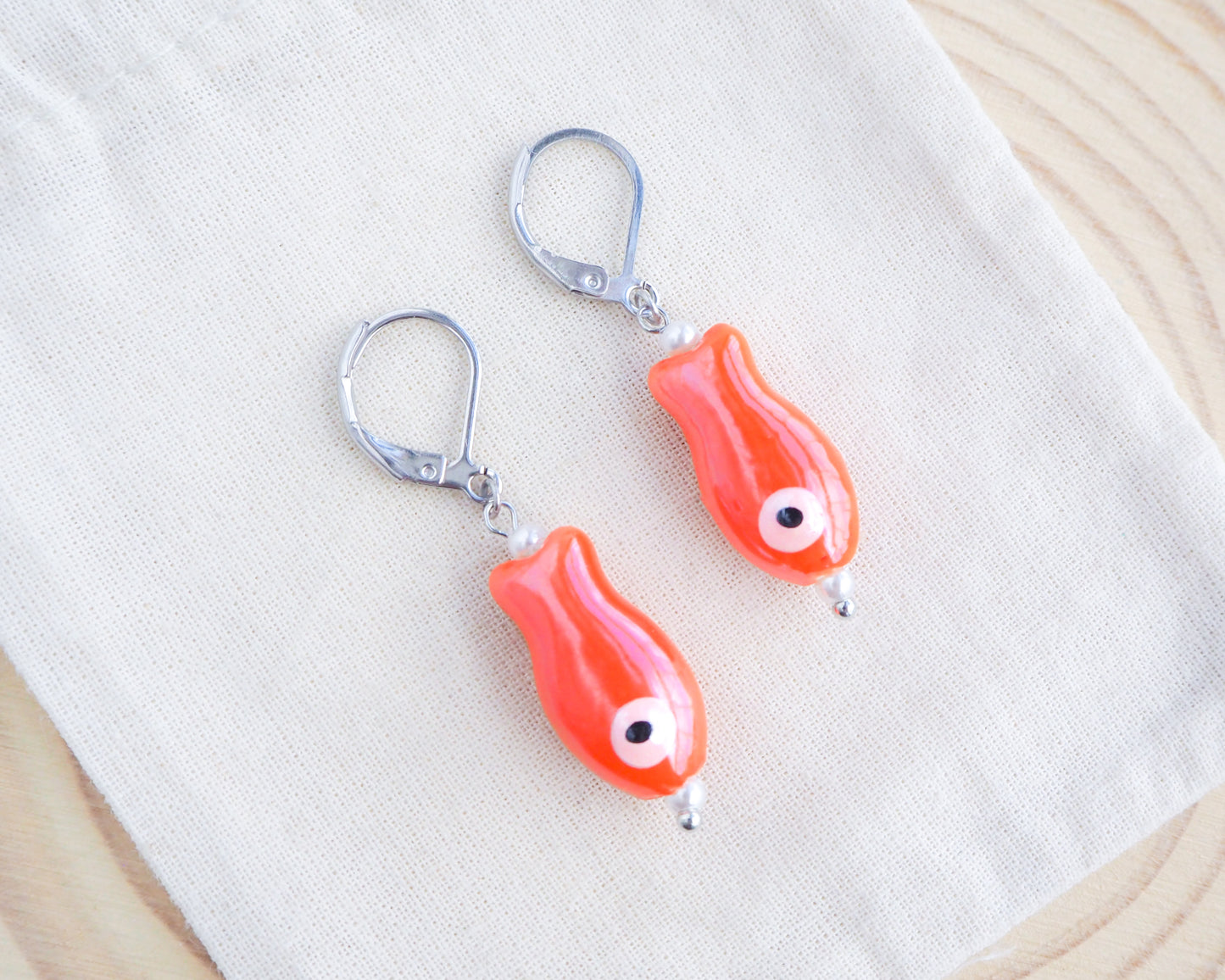 Orange Ceramic Fish Silver Earrings on display, Ceramic Orange Fish, Summer Earrings