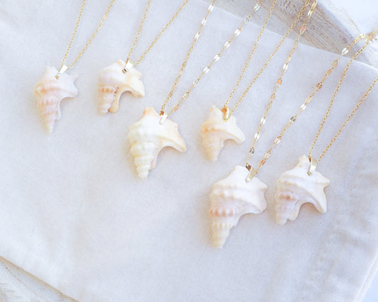 Side view of Pelican Foot Shell Gold Necklaces from Portugal