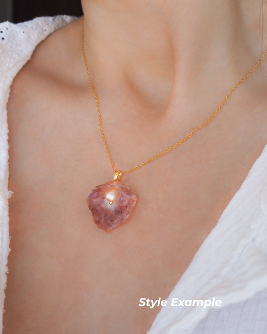 Necklace with a pink pendant worn by a person, with 'Style Example' text.