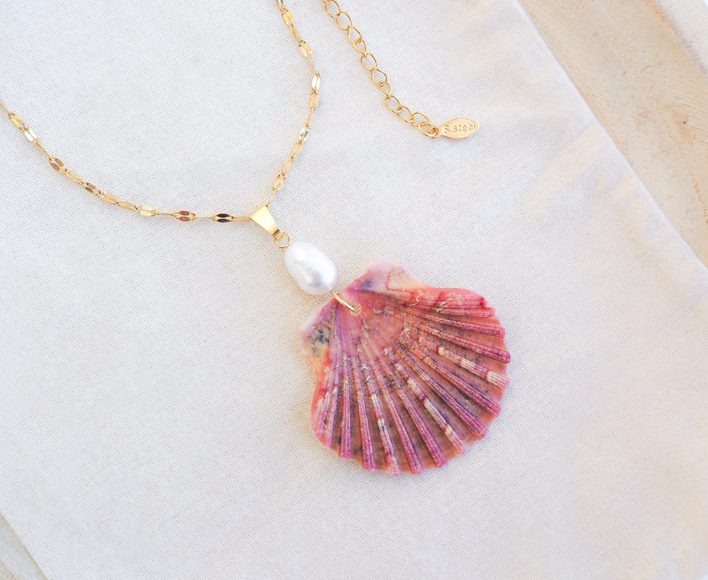 Pink Scallop Shell Pearl Necklace on display, Gold Necklace with Great Scallop Shell and Freshwater Pearl on display