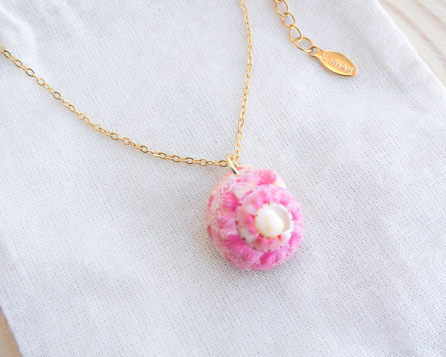 Pink Shell Gold Necklace, Pink Magus Top Shell from Portugal on display