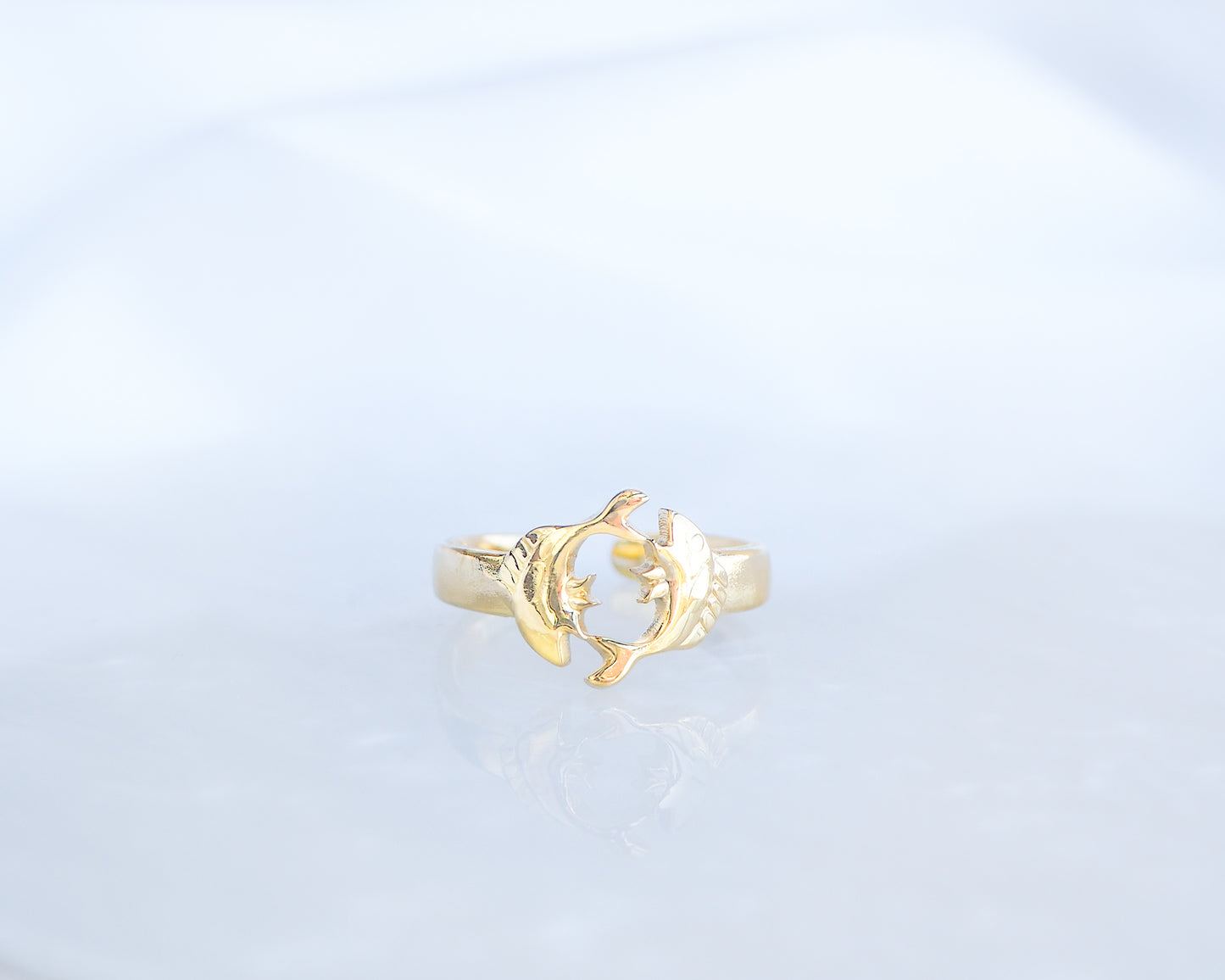 Front view of Gold Pisces Zodiac Ring on display, adjustable 18k gold stainless steel Fish ring