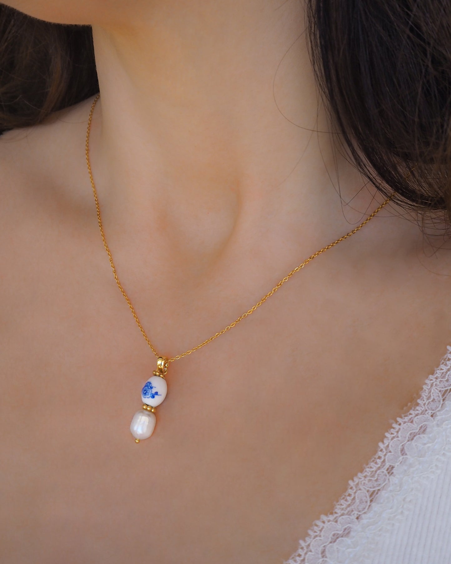 Portuguese Azulejo Ceramic Flower Tile Gold Necklace on model