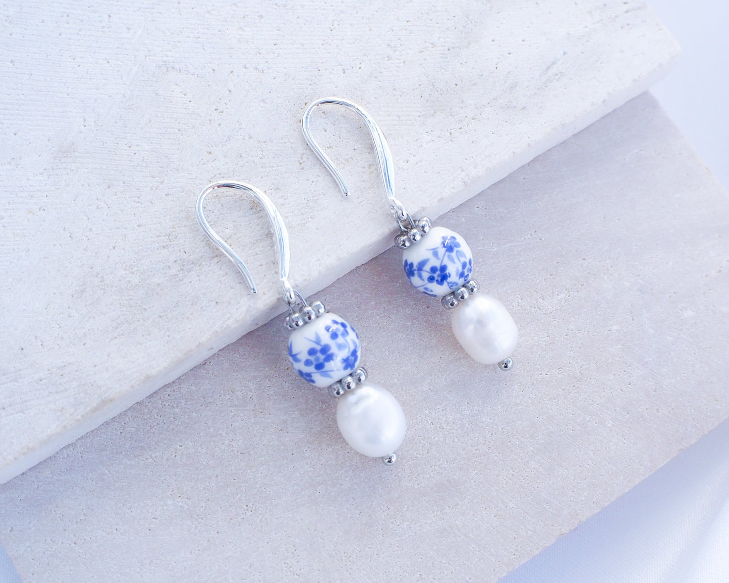 Portuguese Ceramic Pearl 925 Silver Earrings on display, Azulejo Earrings from Portugal, Portuguese Tlle Jewelry, Blue White Flower Porcelain Earringsn