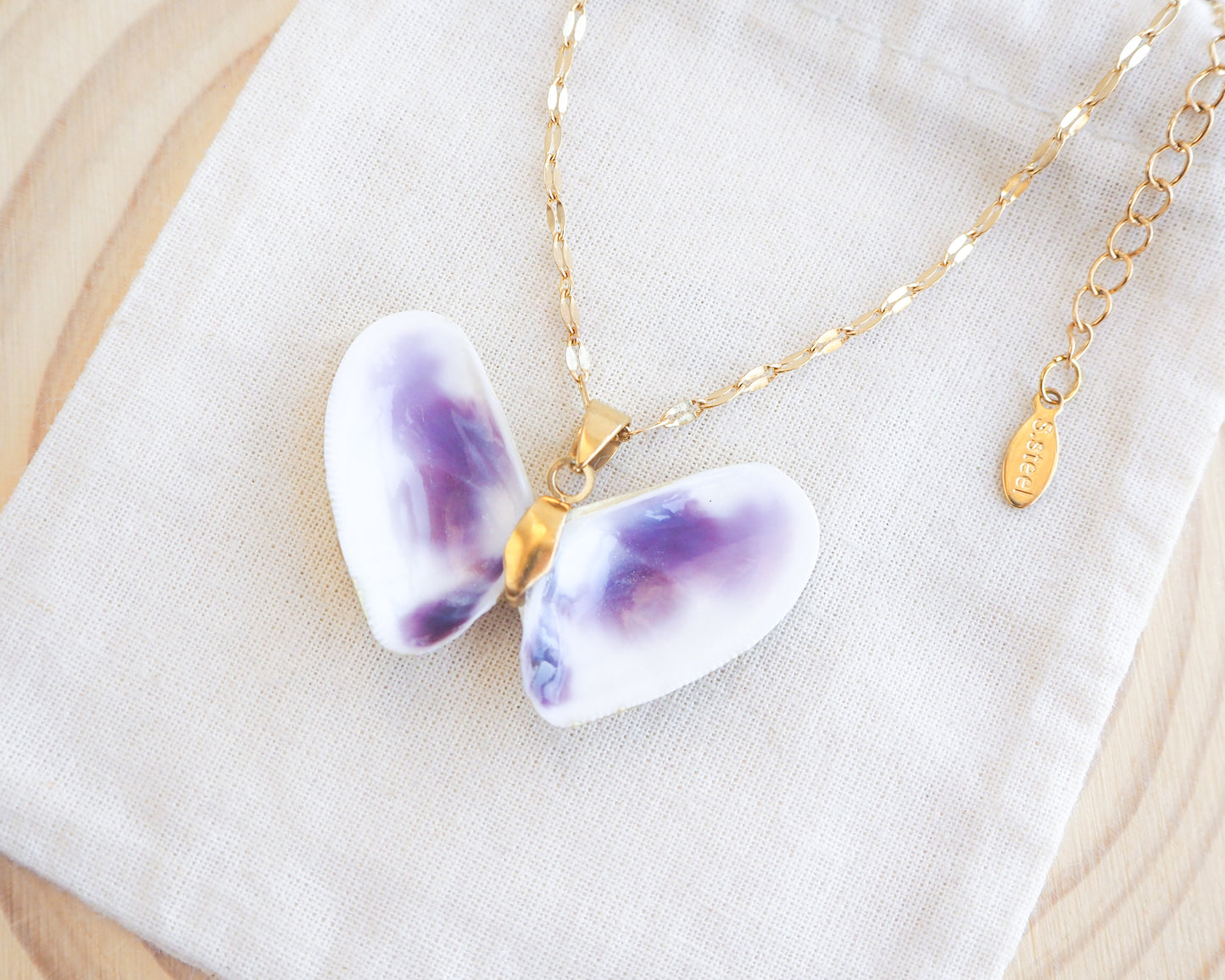 Purple Coquina Sea Butterfly Shell Necklace XII on display side view