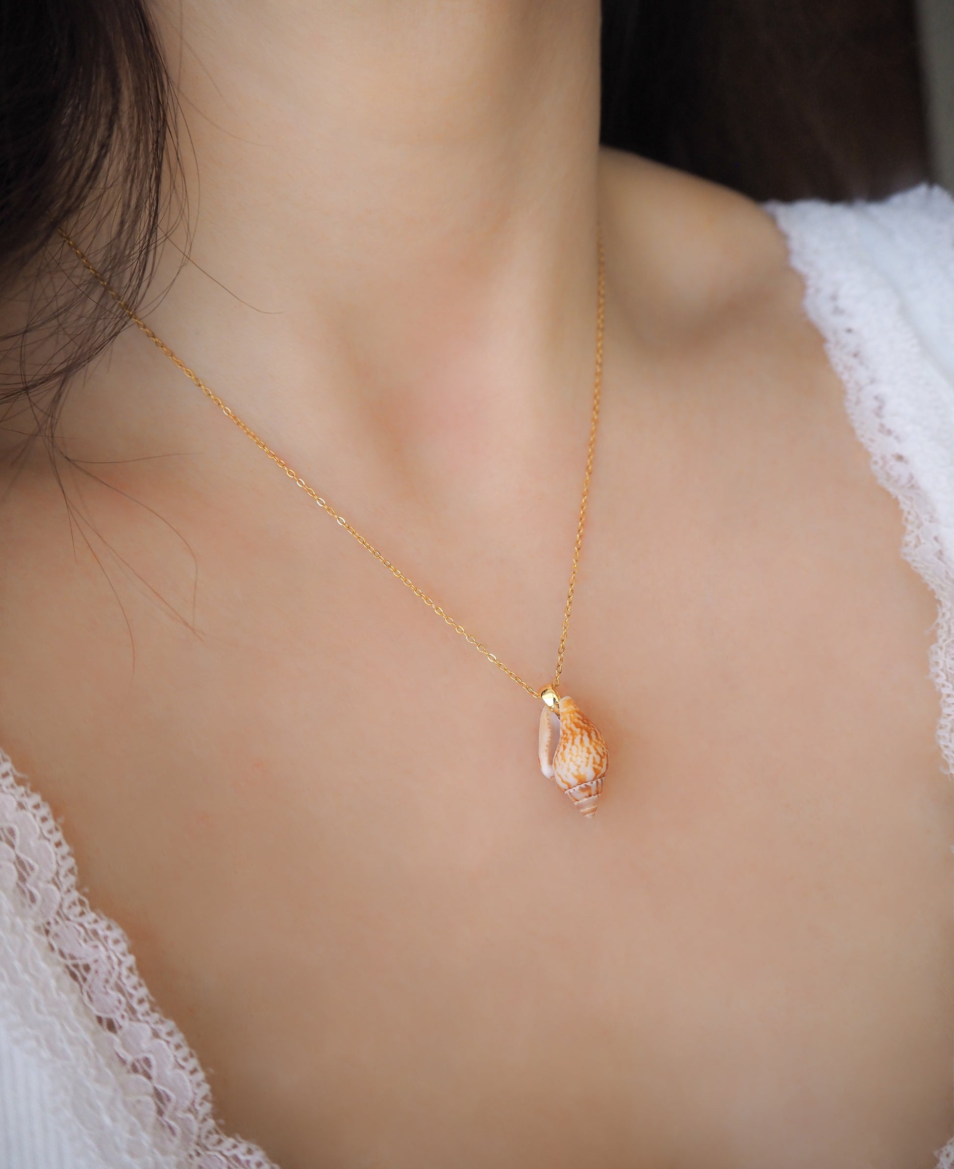 Model wearing Rustic Dove Shell Gold Necklace, Detailed view of the Rustic Dove Shell pendant from Portugal, Sea By Lou