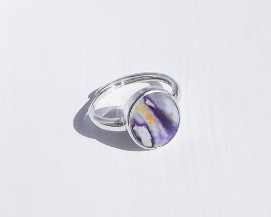 Close-Up of Rainbow Blue Mussel Shell in 925 Silver Ring found on the beach of portugal