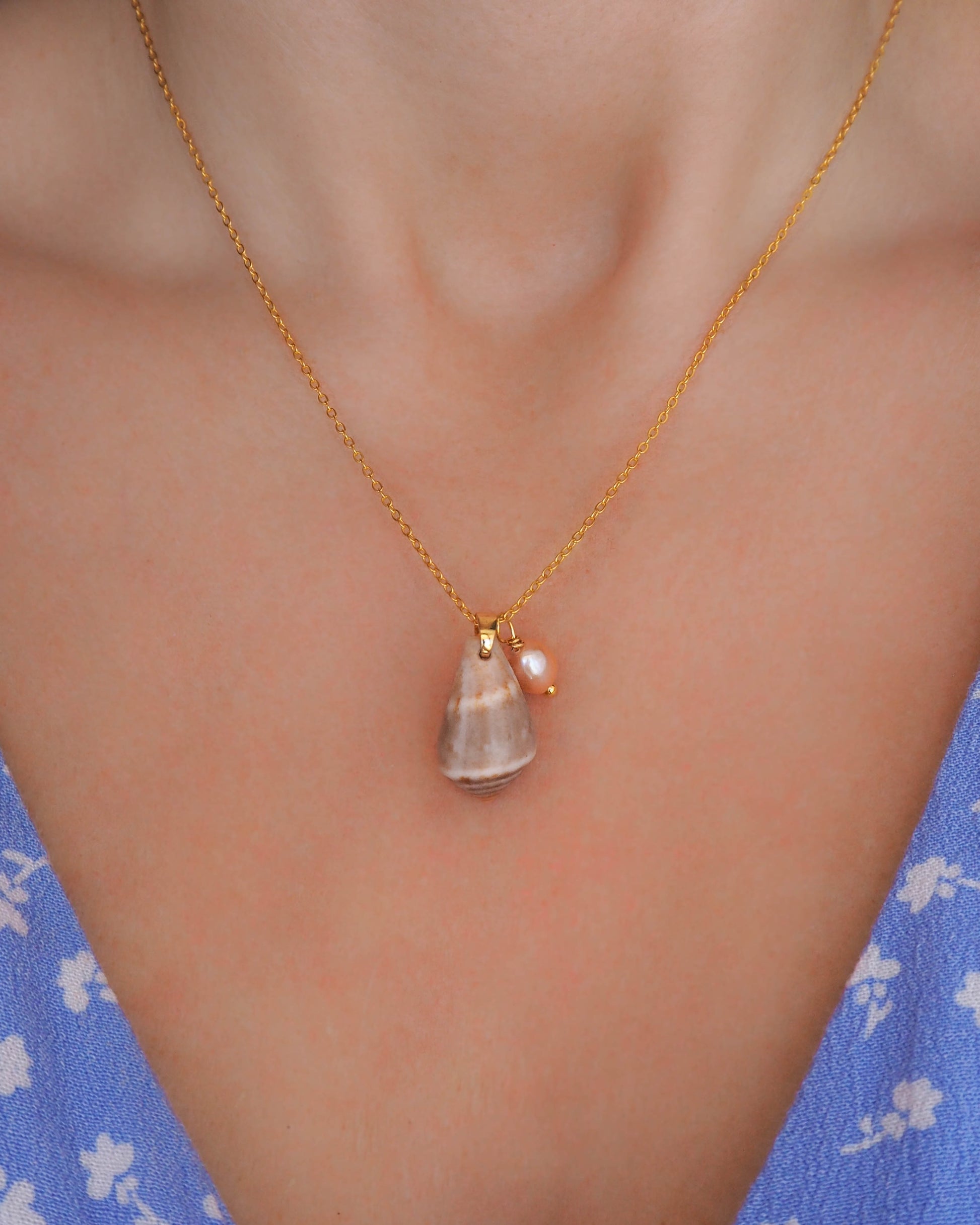 Model wearing Cone Shell Freshwater Pearl Pendant on 18K Gold-Plated 925 Silver Necklace