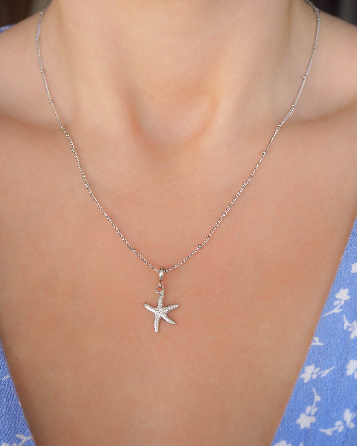 Model wearing Ocean Inspired Jewelry,Sea Star Silver Necklace – Stainless Steel Coastal Jewelry, Hypoallergenic Elegance for Beach Girls, Sea by Lou, Cuba dots necklace chain, Starfish pendant