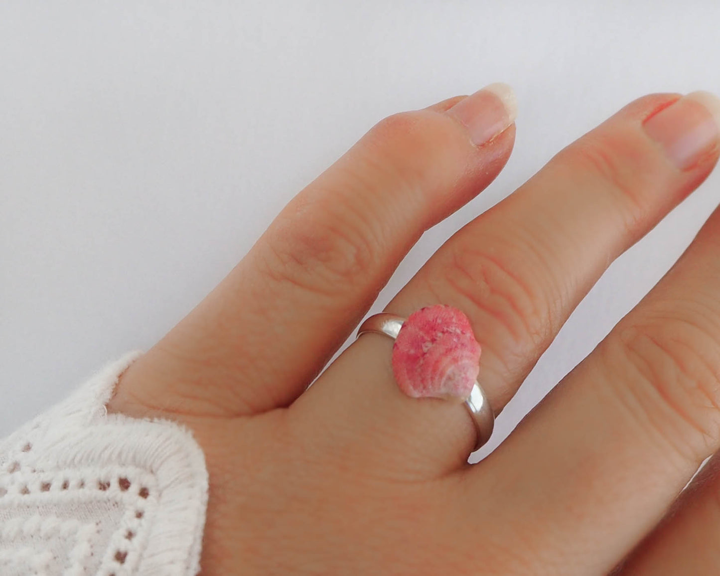 Model wearing Fuchsia Venus Shell Ring, adjustable ring on display, mini seashell ring, shell from portugal, beach girl gift from portugal, seabylou
