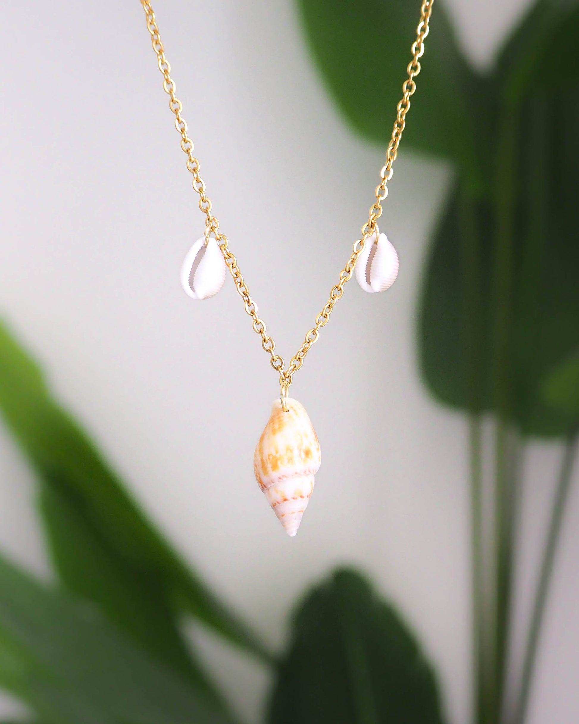 Close-up of Shell Necklace: Cowrie Shell  and Rustic Dove Shell on Gold Stainless Steel Necklace, Coastal Jewelry from Portugal