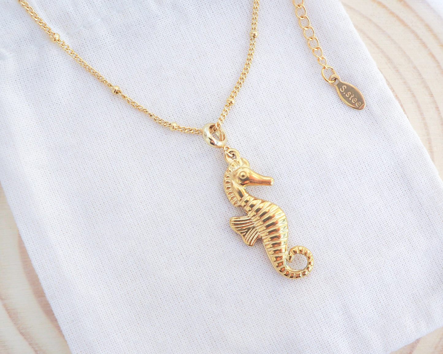 Gold Seahorse Necklace - Hippocampus necklace on display - Ocean-Inspired Jewelry, Sea by Lou, Seabylou