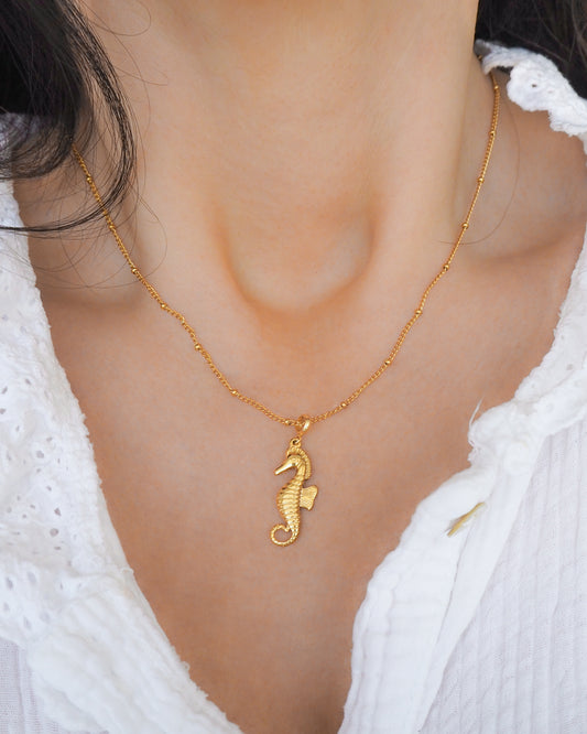 Model wearing Gold Seahorse Necklace - Hippocampus necklace - Ocean-Inspired Jewelry, Sea by Lou, Seabylou