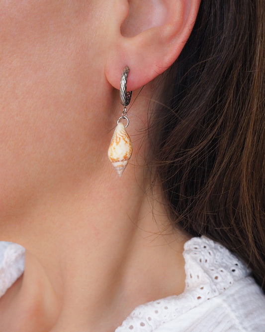 Model wearing Rustic Dove Shell Earrings with Silver Hoop Hooks