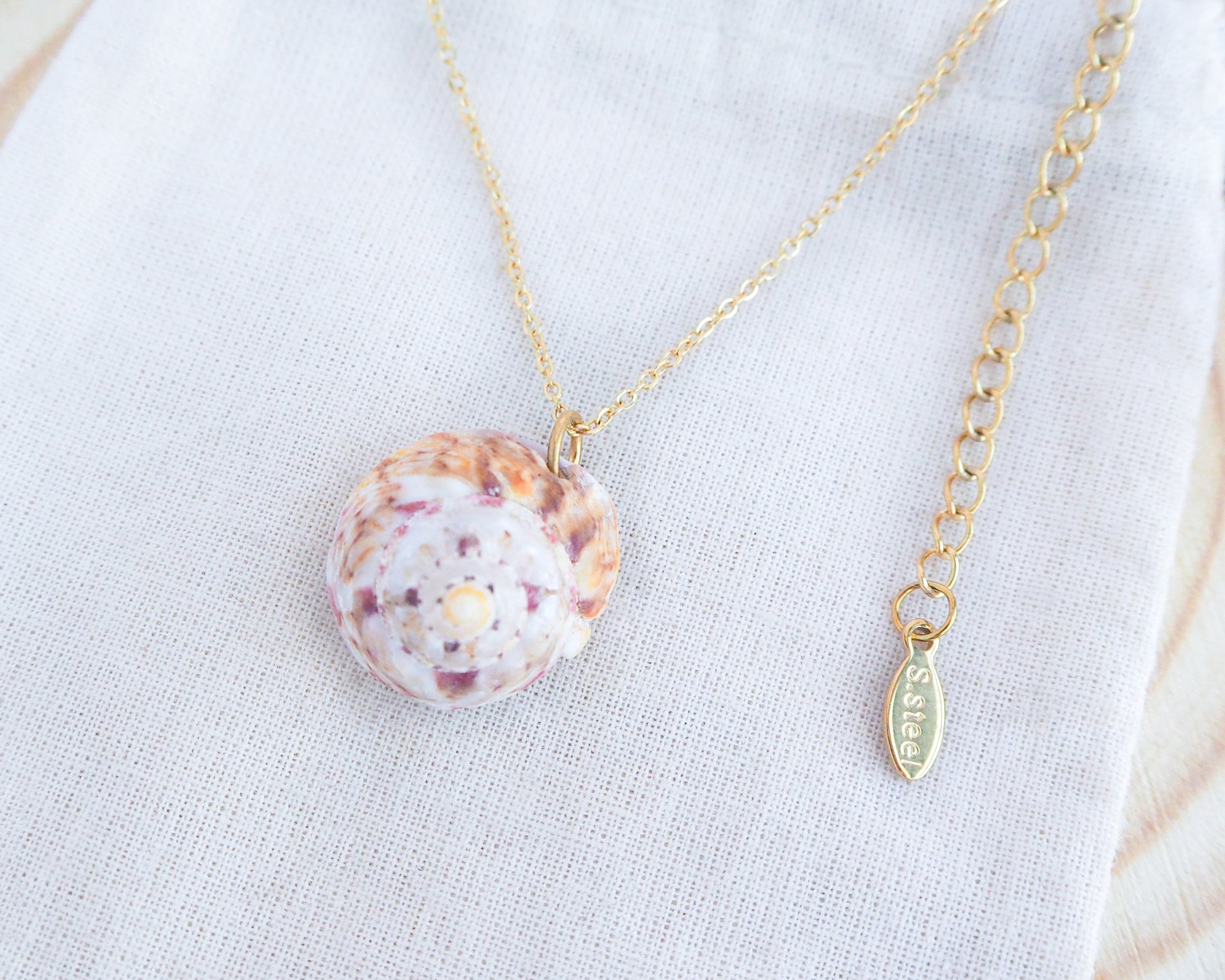 Sunny Magus Top Shell Necklace from Portugal on display