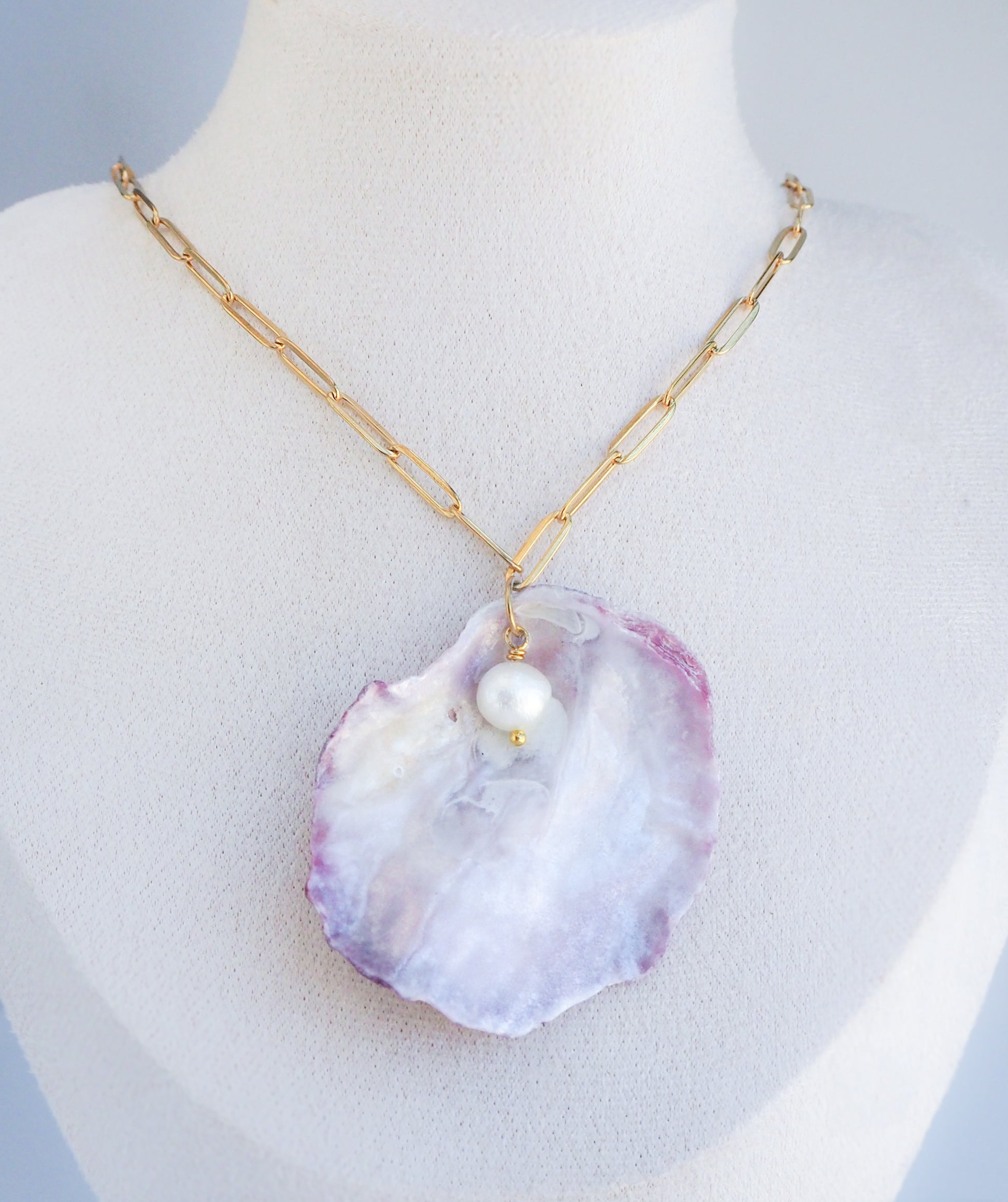 Big Pink Mother of Pearl Jingle Shell Necklace with Freshwater Pearl on neck