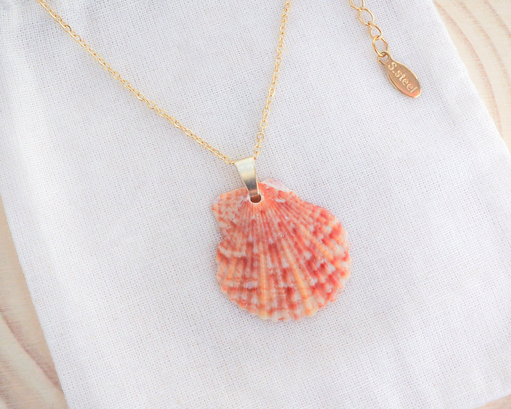 Sunrise Scallop Shell Necklace, Orange Scallop Shell from Portugal on display