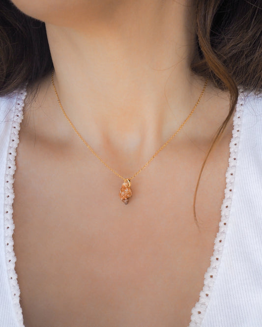 Tiny Dove Shell Gold Necklace on neck, Tiny shell from Portugal