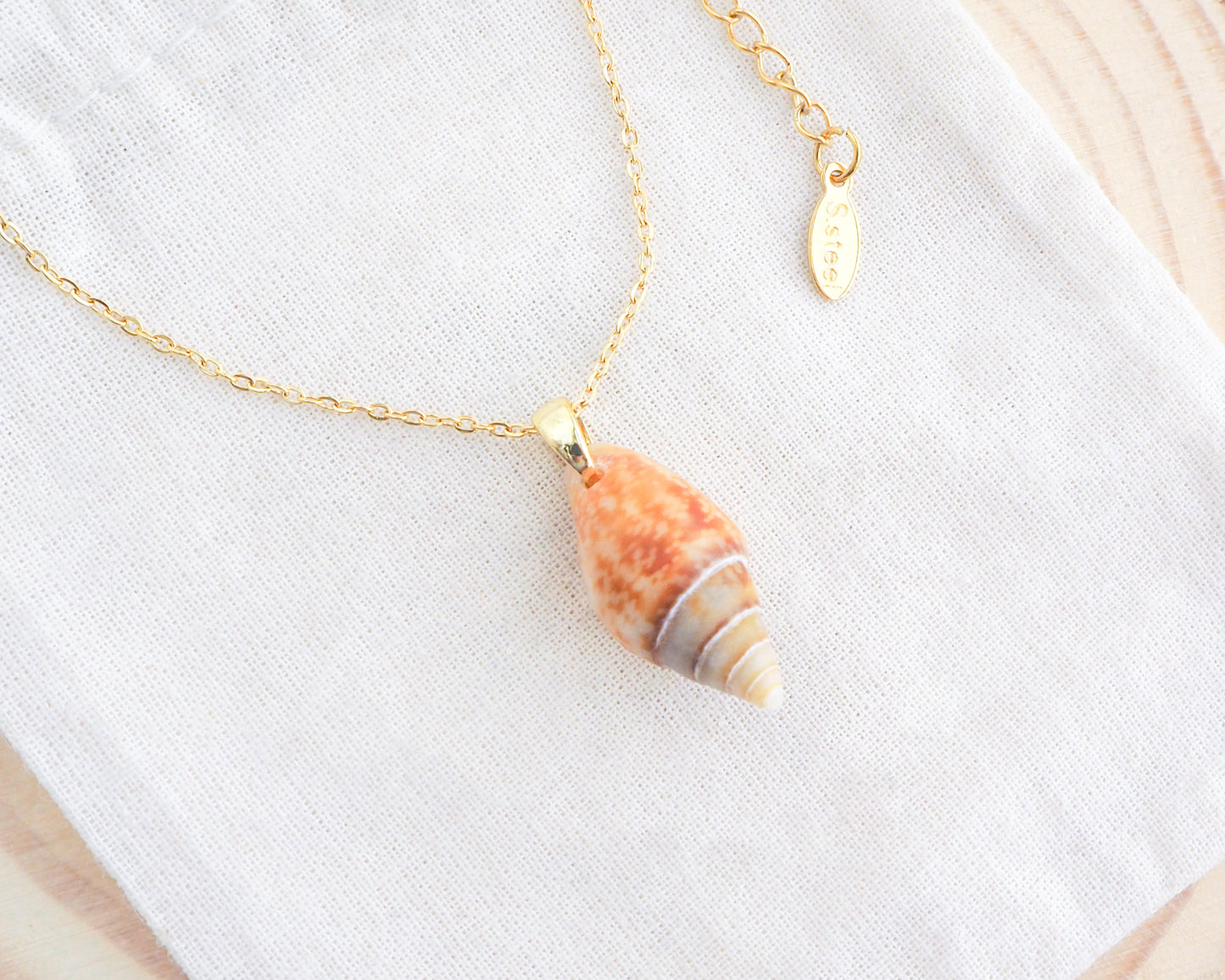 Rustic Dove Shell Gold Necklace on display, Light Rustic Dove Shell from Portugal