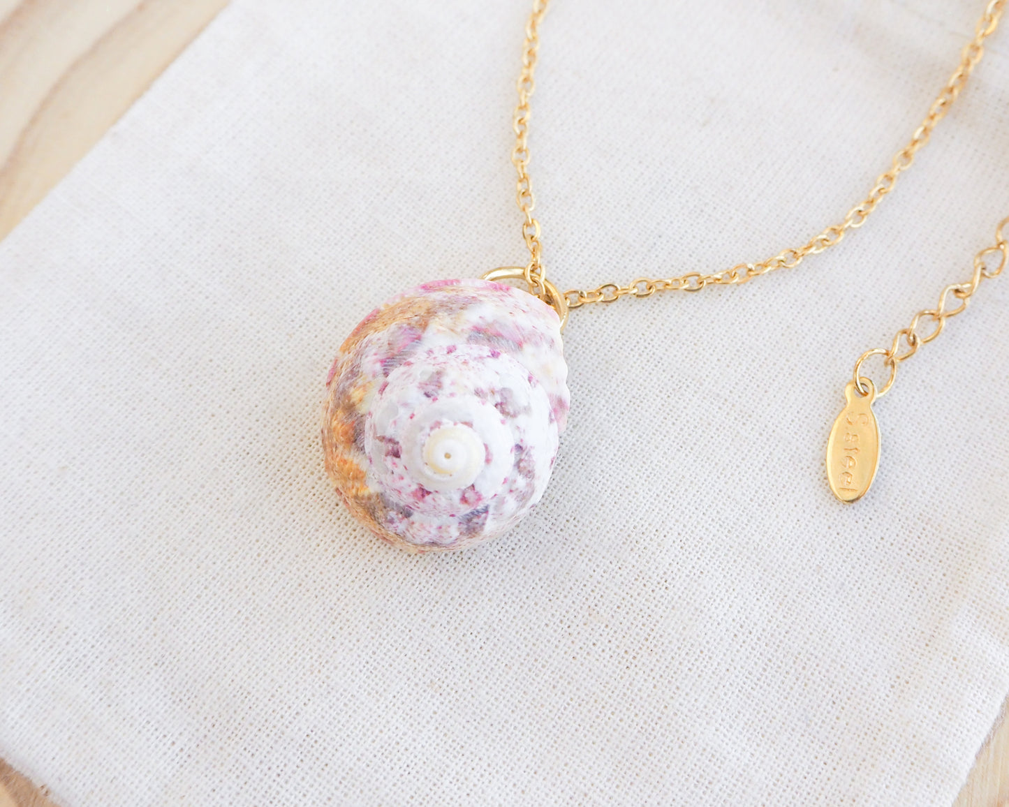 Sunny Pink White Orange Magus Top Shell Gold Necklace on display side view