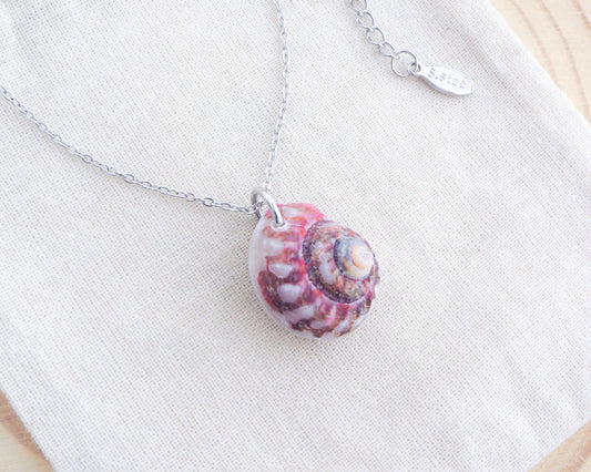 Fuchsia Magus Top Shell Silver Necklace side view on display