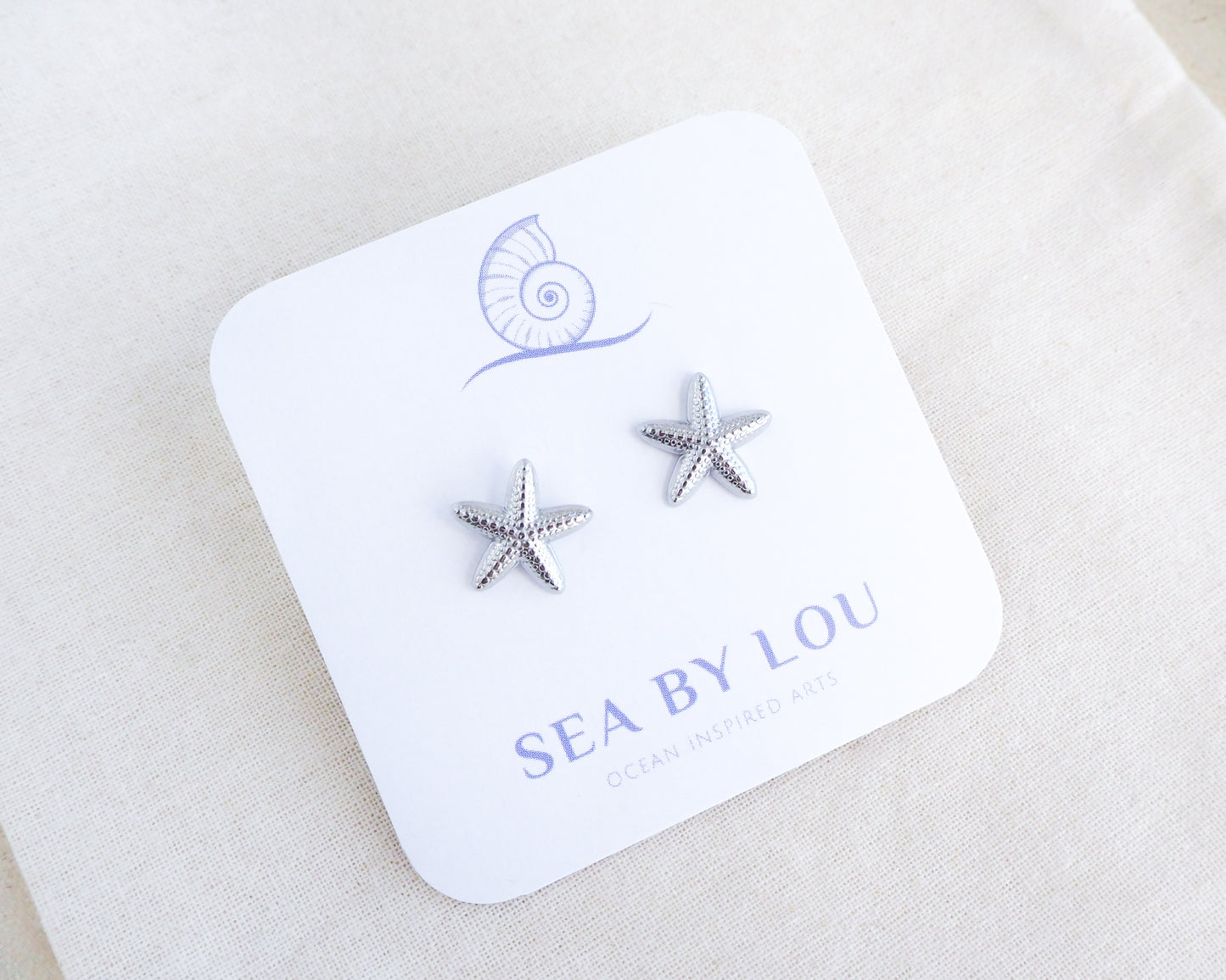 Silver Starfish Stud Earrings, Silver Sea Star Earrings on display, sea by lou