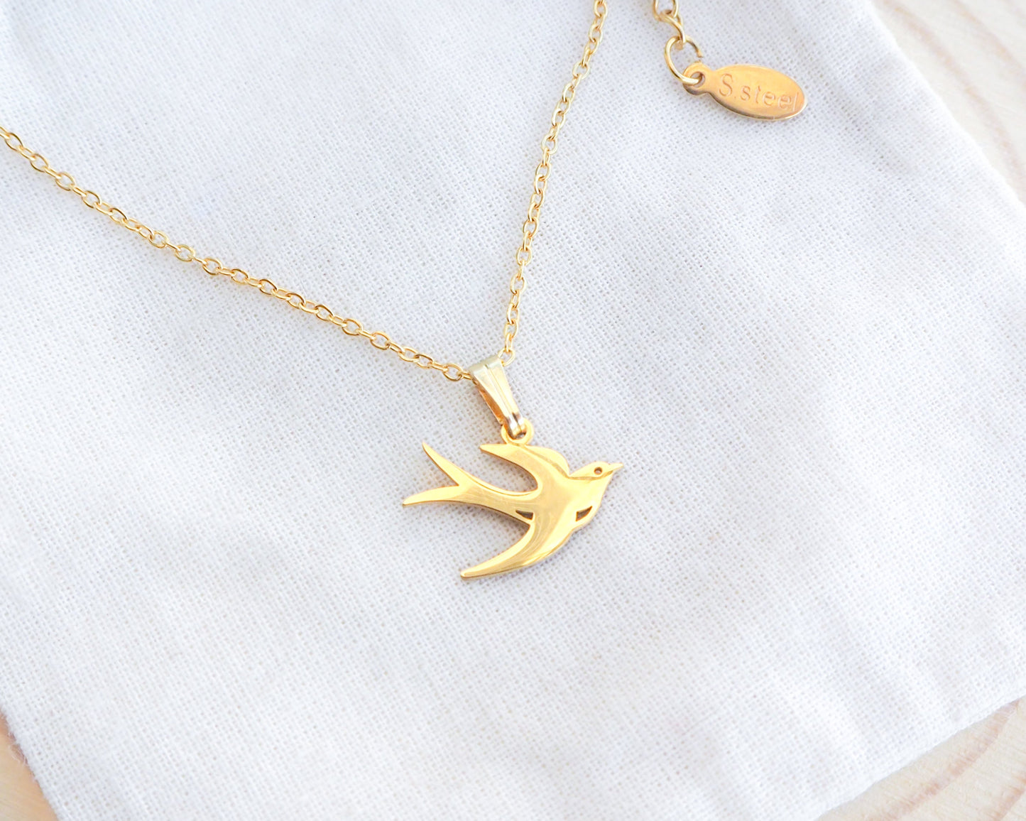 Portuguese Swallow Bird Andorinha Gold Necklace on display