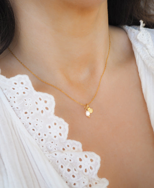 Gold Tiny Shell Pearl Necklace on model