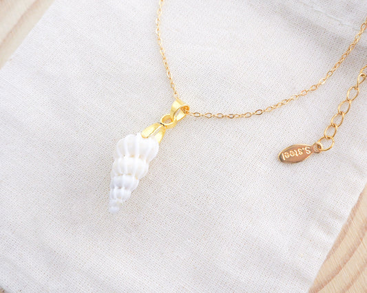 Tiny White Wentletrap Necklace on display side view