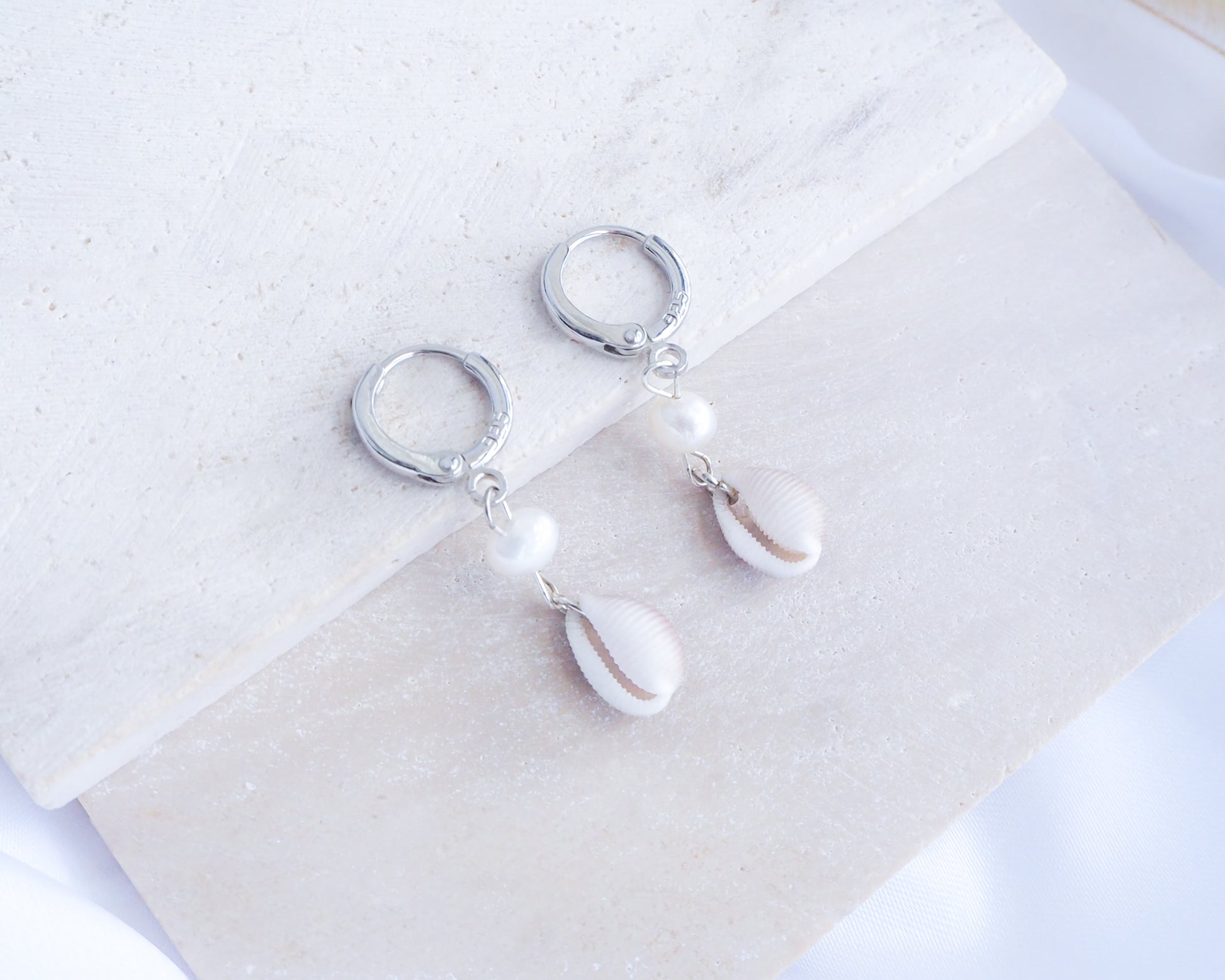 Tiny cowrie shell earrings with freshwater pearls and 925 silver hoops, beach wedding jewelry