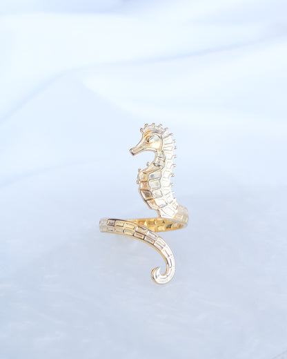 Front view of Gold Seahorse Ring on a light background, made with 18k gold stainless steel and adjustable size