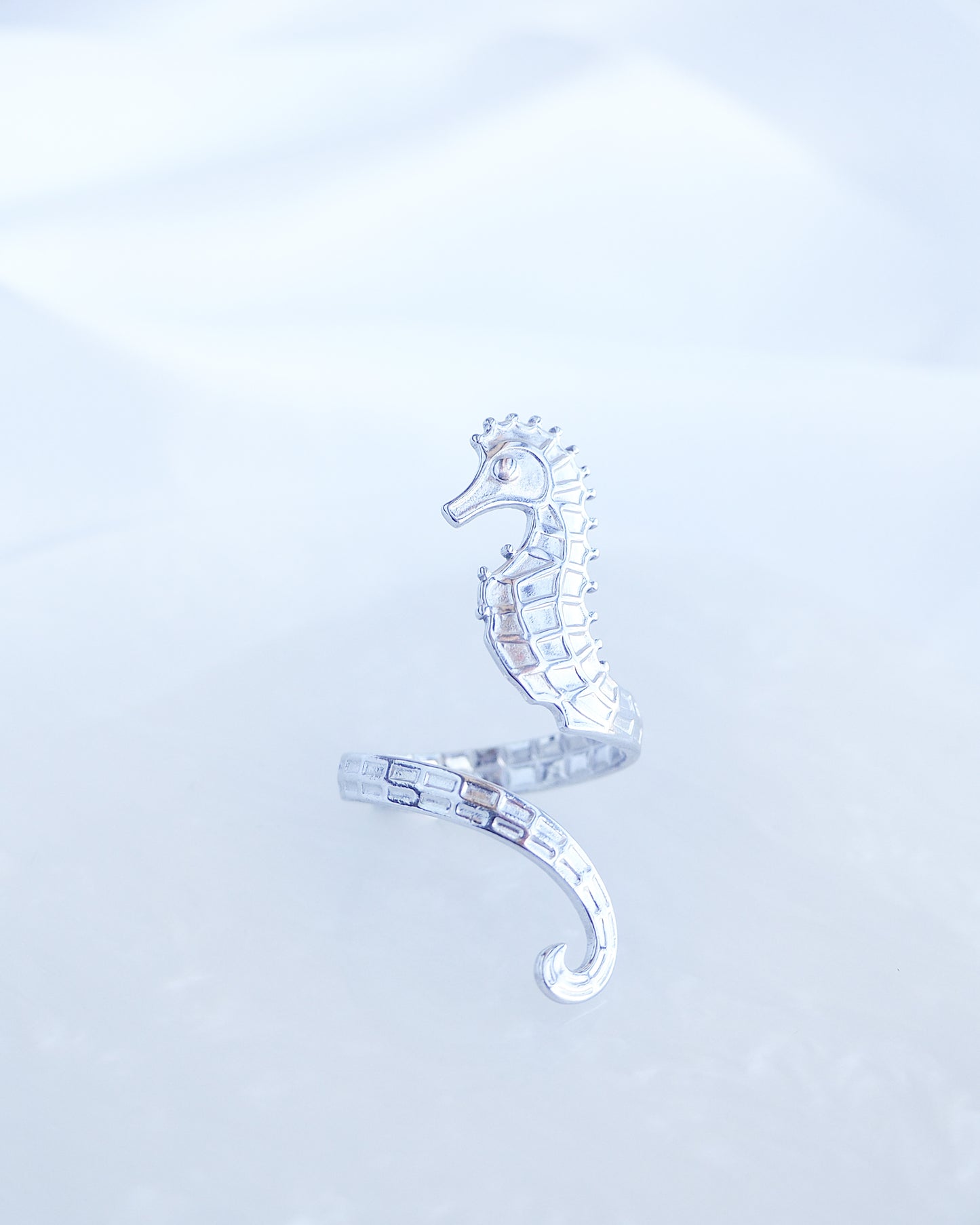 Front view of Silver Seahorse Ring on a light background, made with 18k gold stainless steel and adjustable size
