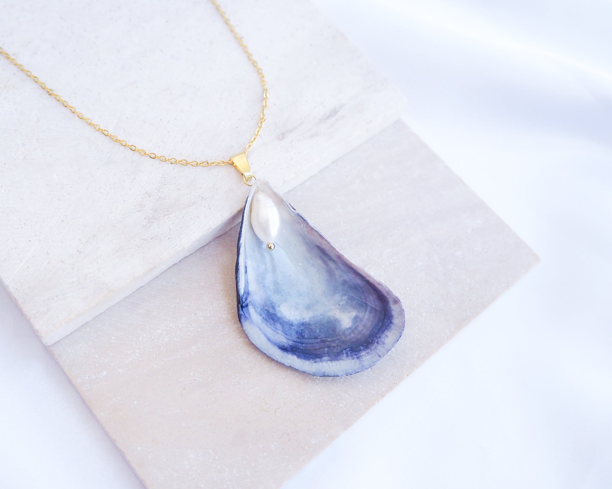 Blue Mussel Pearl Gold Necklace displayed, Gold Pearly Mussel Shell Necklace, Mussel Pearly Shell handpicked from Portugal, Sea by Lou, Mother of Pearl Shell Portugal 