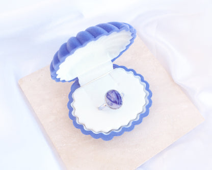 Blue Velvet Seashell Jewelry Box with Mussel Shell Ring, Shell shaped jewelry box blue velvet seashell jewellery box on stone displayed 